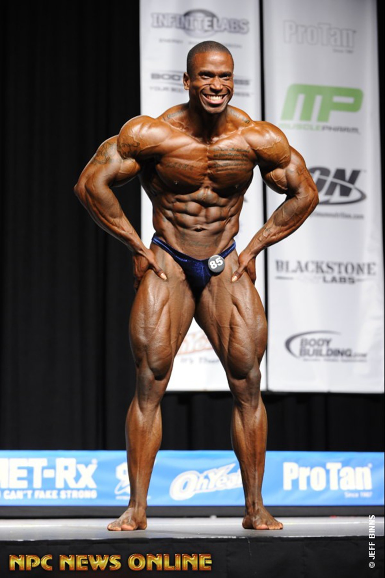 Tech. Sgt. David, 432nd Maintenance Group contract officer representative, poses for the judges of the 2015 National Physique Committee National Bodybuilding Championships Nov. 21, 2015, in Miami, Florida. David took first place against 27 other competitors in the middleweight class and 177 others overall taking second in the national competition. By winning his weight class, David received his International Federation of Bodybuilding and Fitness professional card, a dream he’s been chasing for six years. (U.S. Air Force photo by Airman 1st Class Christian Clausen/Released) 