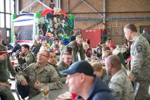 Airmen and families enjoy some holiday merriment at the 934th Operations and Maintenance Group holiday party. (Air Force Photo/Staff Sgt. Trevor Saylor)