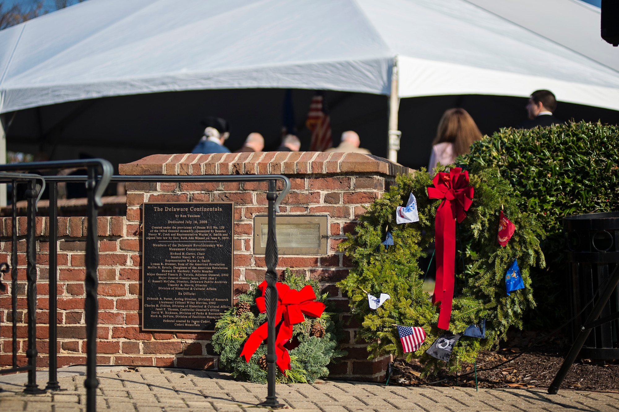 Two wreaths lay prepositioned at the Delaware Continentals memorial during the Wreaths Across America ceremony December 7 in Dover, Del. Col. Scott Durham, 512th Airliftt Wing commander, along with other Airmen from Dover Air Force Base, attended the ceremony to show support for the event. (U.S. Air Force photo/Capt. Bernie Kale)