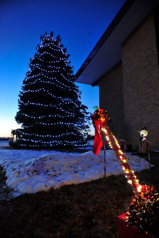 The Freedom Chapel Christmas tree illuminates the night at Ellsworth Air Force Base, S.D., Dec. 2, 2015. The lights were switched on by children of deployed Airmen during the 28th Bomb Wing tree lighting ceremony. (U.S. Air Force photo by Airman 1st Class James L. Miller/Released)