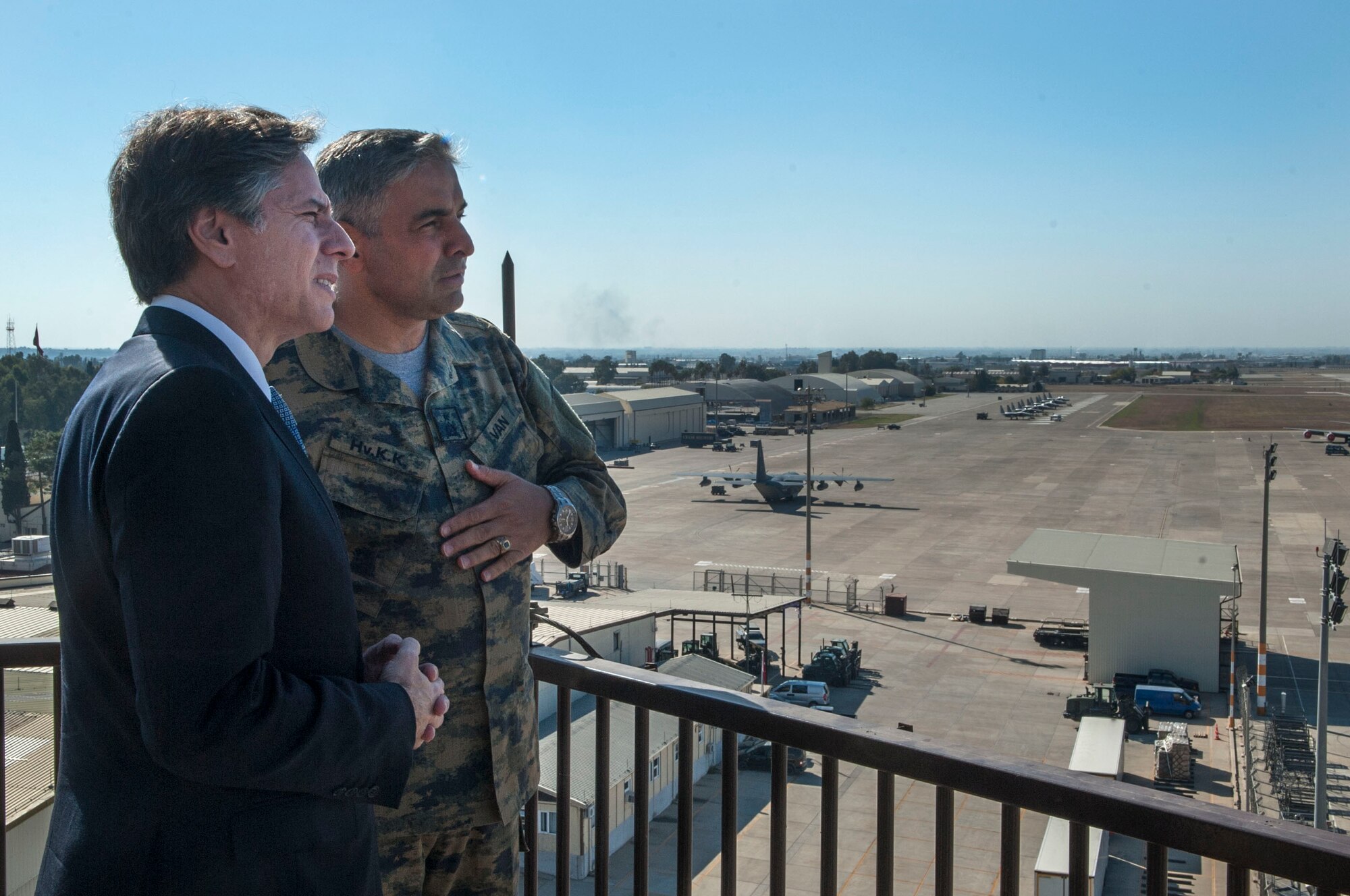 U.S. Deputy Secretary of State Antony Blinken speaks with Brig. Gen. Bekir Ercan Van, 10th Tanker Base Command commander, as they observe the airfield Nov. 20, 2015, at Incirlik Air Base, Turkey. Blinken visited Incirlik to meet with leadership, interact with Airmen and garner a better understanding of how the base supports Operation Inherent Resolve. (U.S. Air Force photo by Staff Sgt. Jack Sanders/Released)