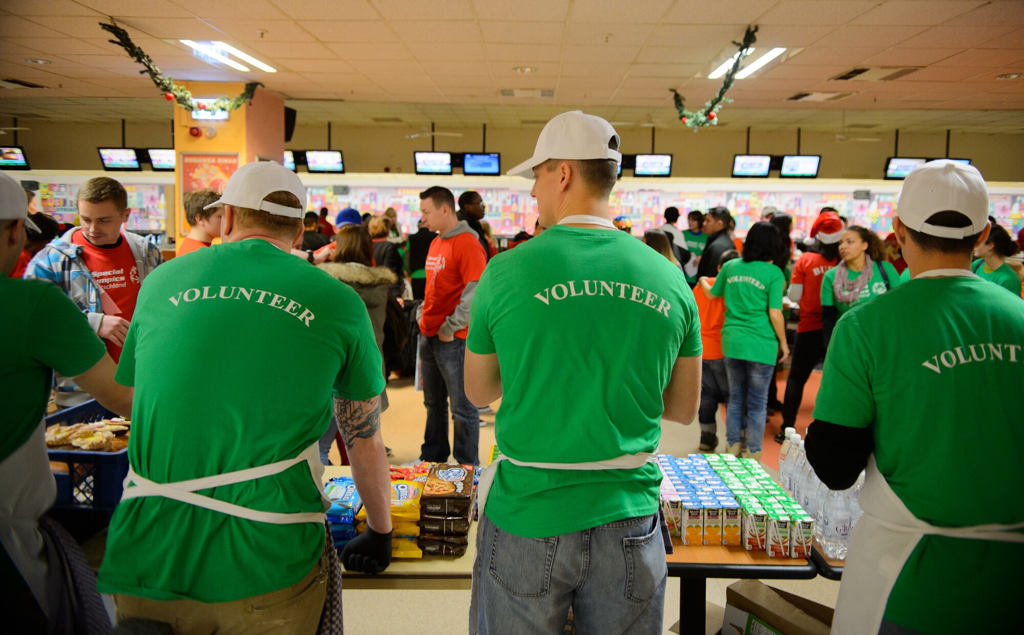 Airmen from the 450th Intelligence Squadron volunteer during the annual Special Olympics Dec. 4, 2015, at Vogelweh Military Complex, Germany. More than 50 Airmen from the 450th IS volunteered around the Kaiserslautern Military Community during Warbirds’ Service Day. (U.S. Air Force photo/Staff Sgt. Armando A. Schwier-Morales)