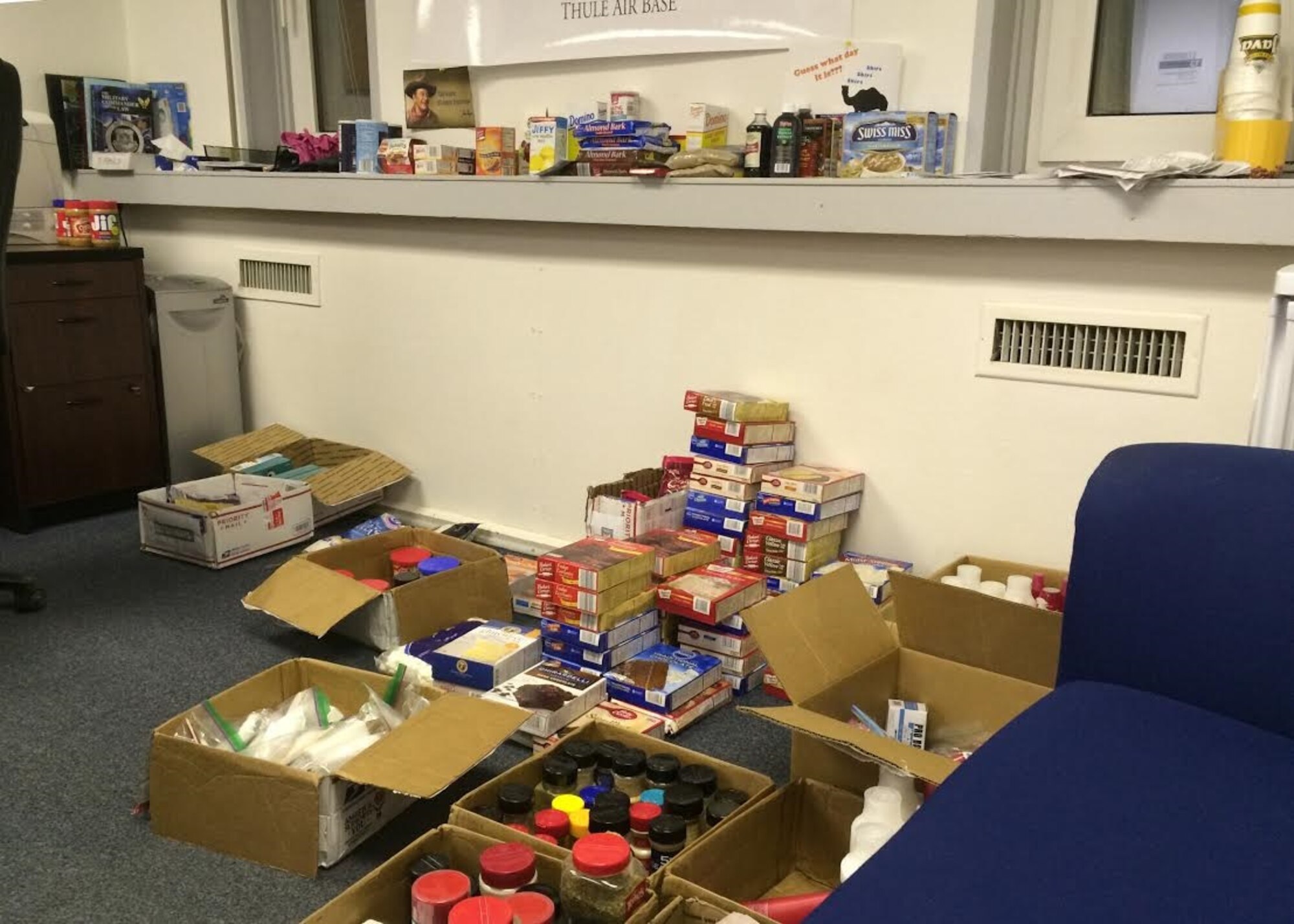 THULE AIR BASE, Greenland – Members of the 821st Air Base Group receives care packages from students from Northview School, Peru, Ill., Nov. 19, 2015. The students sent a variety of baking, cold weather supplies and more. (Courtesy photo)