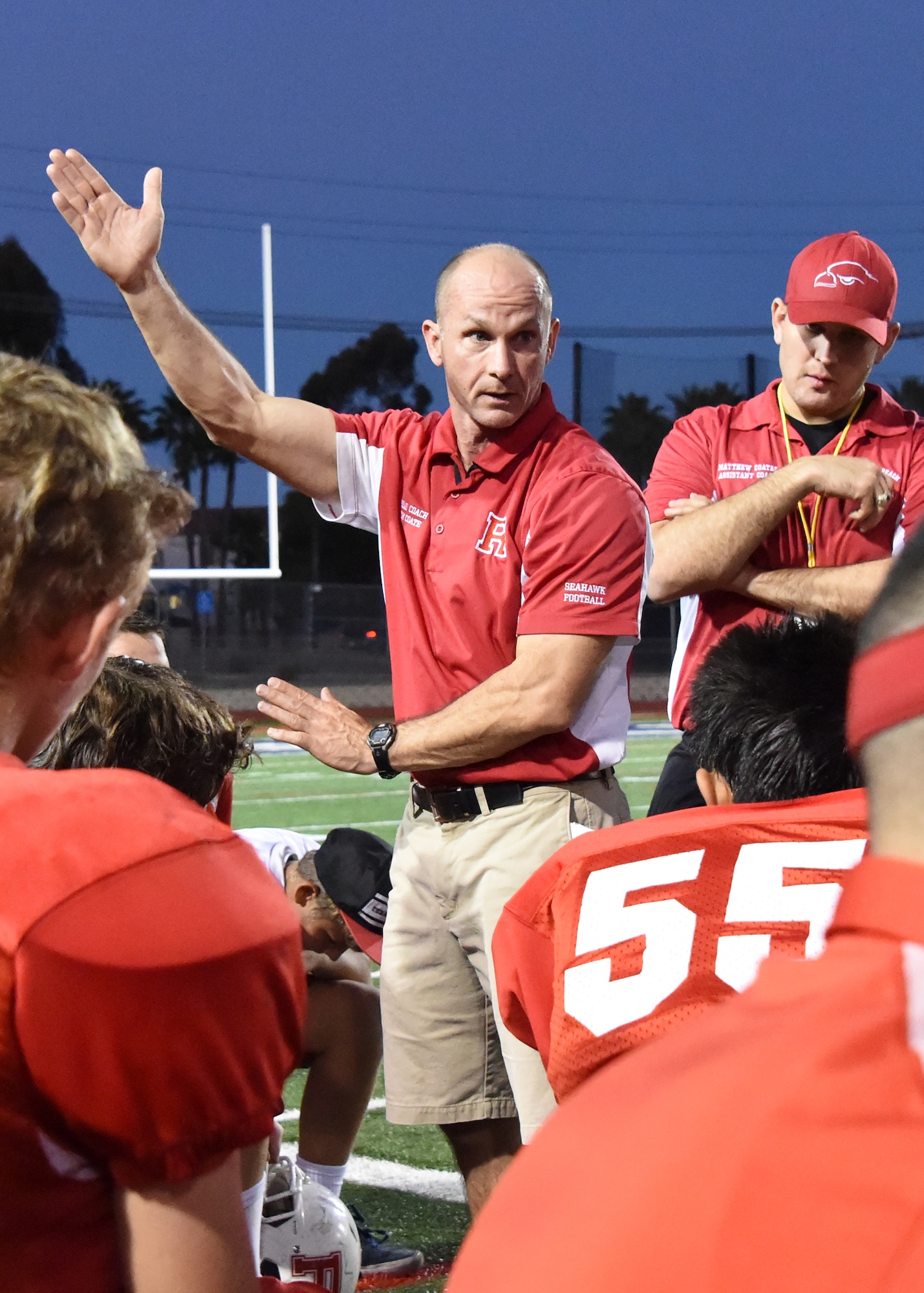 Lt. Col. Thomas Coate from the Space and Missile Systems Center at Los Angeles Air Force Base in El Segundo, Calif., emphasizes the strategic and tactical differences of a play as head coach of the Redondo Sea Hawks during a Pop Warner 2015 WESCON Regional Semifinals, Midget-Division II game. Over the last four years, Coate has managed to recruit over twenty active-duty and civilian personnel from Los Angeles AFB as volunteers for the local Pop Warner football team in Redondo Beach, Calif.  (U.S. Air Force photo/Joe 
Juarez Sr.)
