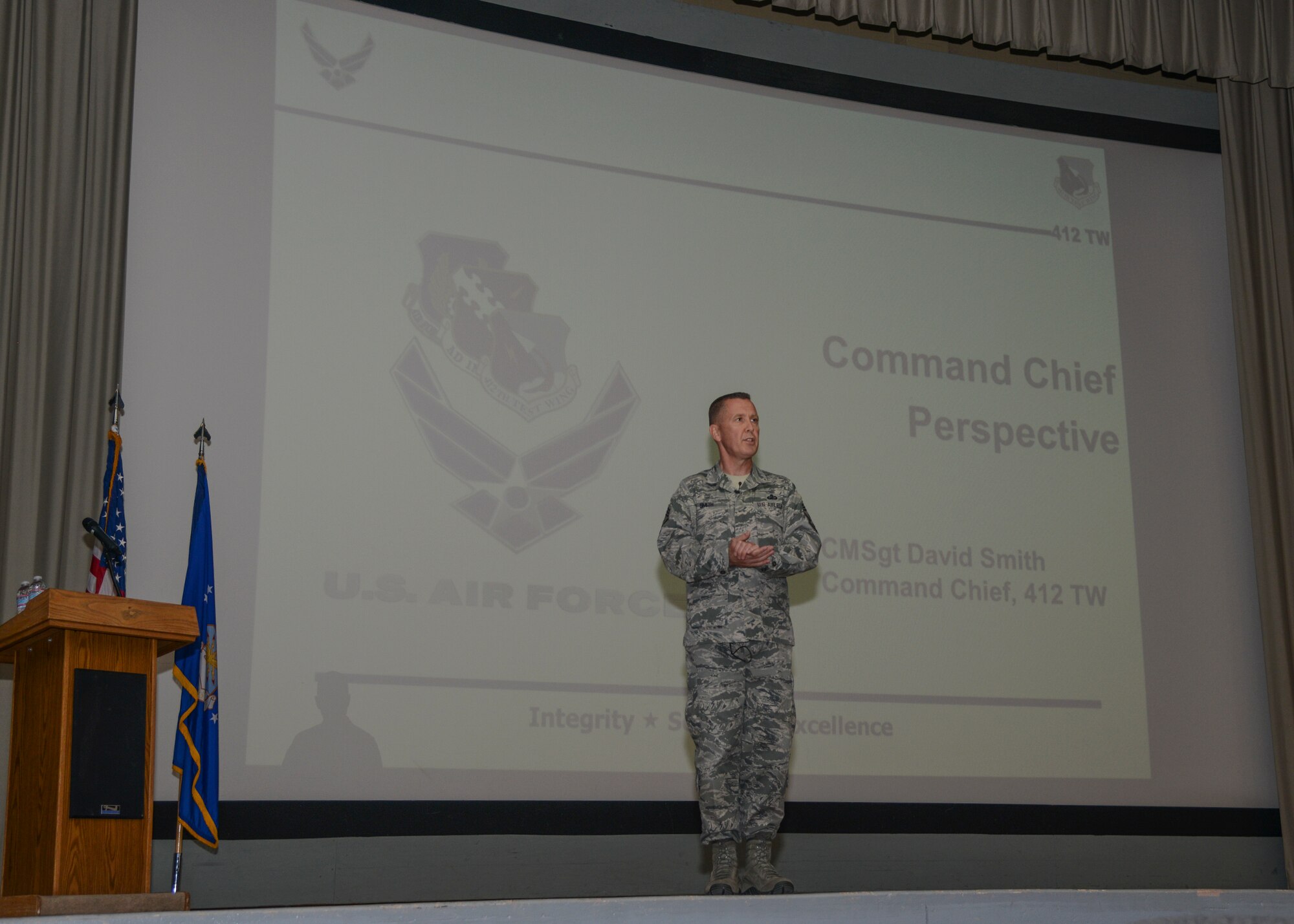 Chief Master Sgt. David Smith, 412th Test Wing command chief, held an enlisted call at the base theater Dec. 7 emphasizing professionalism in the Air Force. (U.S. Air Force photo by Rebecca Amber)