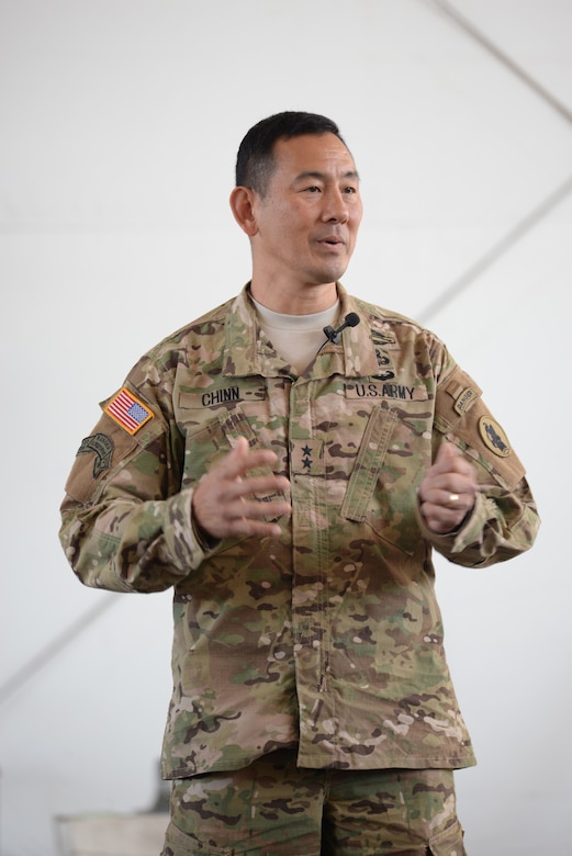 U.S. Army Maj. Gen. K.K. Chinn, Army South commander, speaks to a group of Soldiers stationed at Soto Cano Air Base, Honduras, Dec. 8, 2015 during a town hall style discussion. Chinn came to Soto Cano to give the Soldiers a better idea of how their work is helping to build relationships between partner nations throughout the Central American area of responsibility. (U.S. Air Force photo by Senior Airman Westin Warburton/Released)