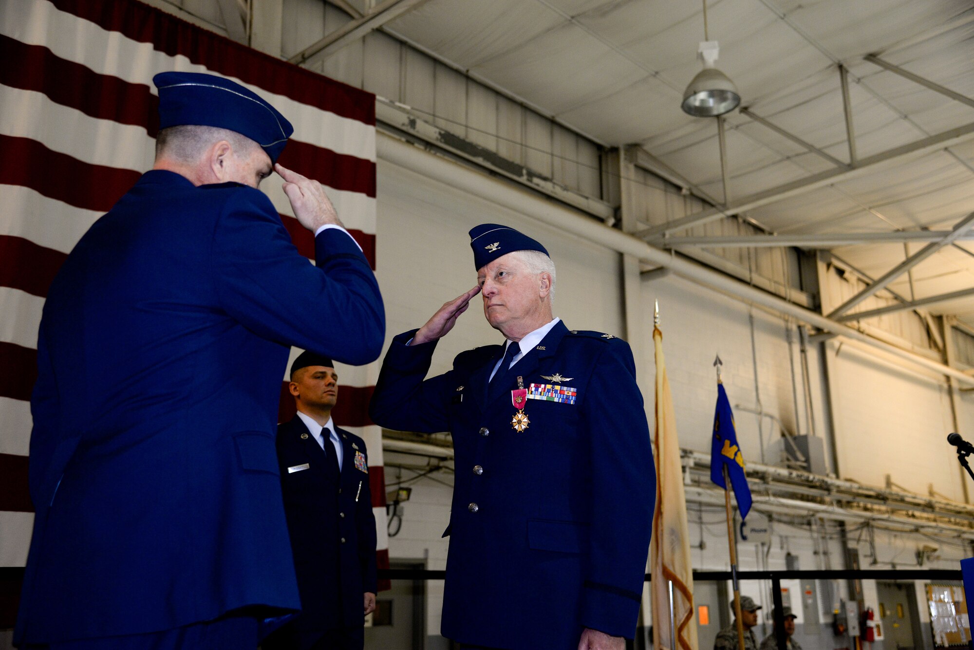 A picture of Col. Michael Love receiving The Legion of Merit.