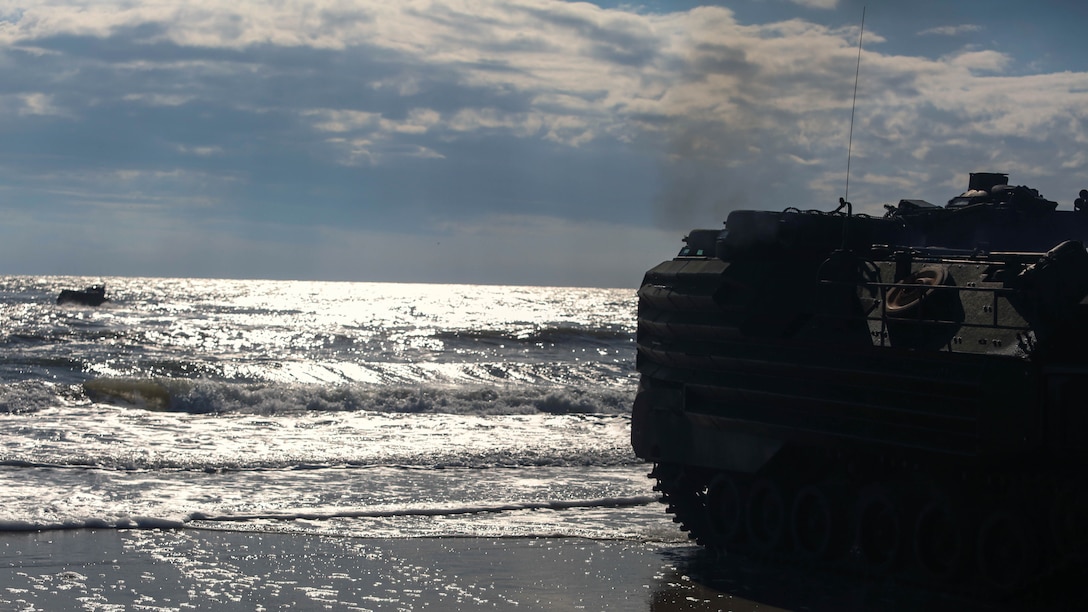 An amphibious assault vehicle prepares to enter the water as Alpha Company, 2nd Assault Amphibian Battalion, begins company-level beach operations on Marine Corps Base Camp Lejeune, N.C., Dec. 5, 2015. During this exercise Marines within the unit had the opportunity to work along-side platoons that they never had before.
