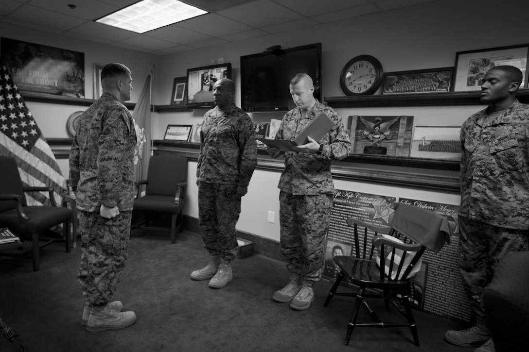 U.S. Marine Corps Gunnery Sgt. Jorge Valdez is awarded the Navy Commendation Medal by the 18th Sergeant Major of the Marine Corps, Ronald L. Green, at the Pentagon, Arlington, VA, Dec. 9, 2015. (U.S. Marine Corps photo by Sgt. Melissa Marnell, Office of the Sergeant Major of the Marine Corps/Released)