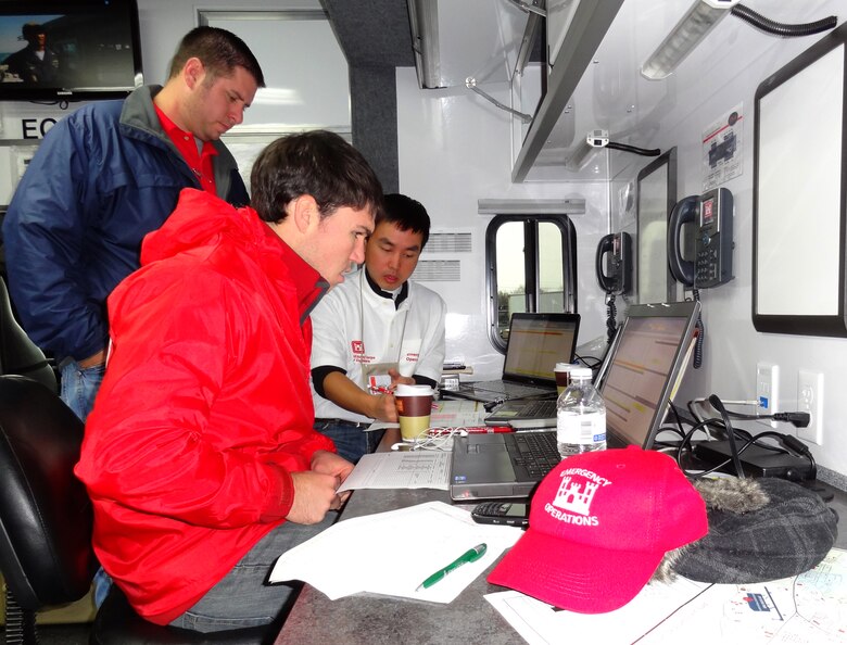 Matthew Rorick (back), Jason Lavecchia (front) and Jimmy Luo of the U.S. Army Corps of Engineers Savannah District work to provide emergency power to areas surrounding Annville, Penn., in response to Superstorm Sandy. As part of the joint federal response led by FEMA, the Corps of Engineers currently has 69 FEMA mission assignments exceeding a total of $254 million. 