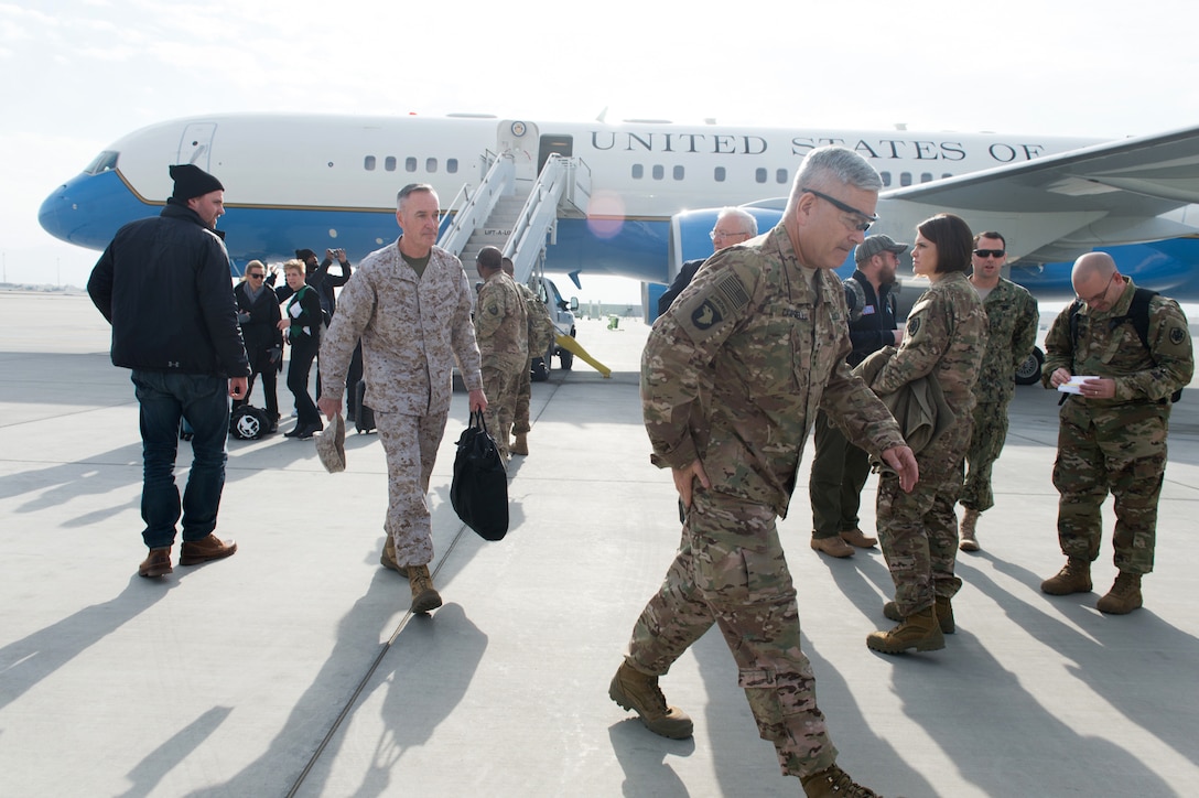 U.S. Army Gen. John F. Campbell, commander of U.S. Forces-Afghanistan and the Resolute Support Mission, and U.S. Marine Corps Gen. Joseph F. Dunford Jr., chairman of the Joint Chiefs of Staff, leave the airfield for a meeting at Bagram Airfield, Afghanistan, Dec. 8, 2015. DoD photo by D. Myles Cullen