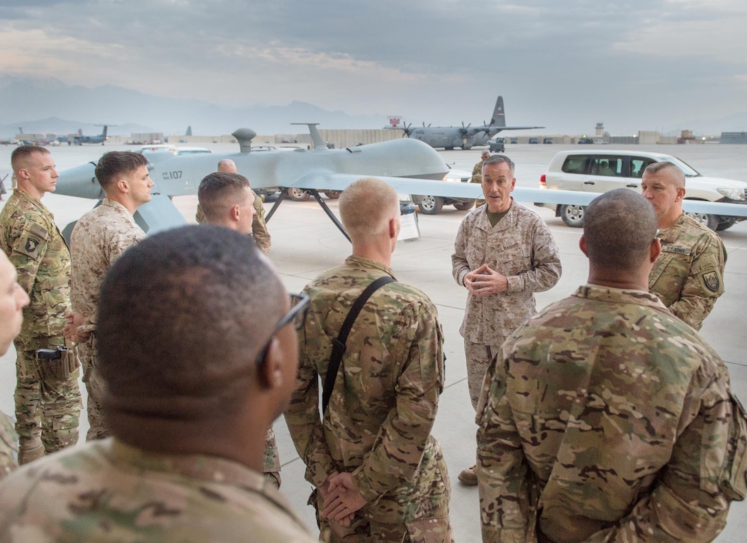 U.S. Marine Corps Gen. Joseph F. Dunford Jr., chairman of the Joint Chiefs of Staff, talks with U.S. service members at Bagram Airfield, Afghanistan, Dec. 8, 2015. Dunford was traveling with USO entertainers to visit deployed service members on three continents during the holidays. DoD photo by D. Myles Cullen