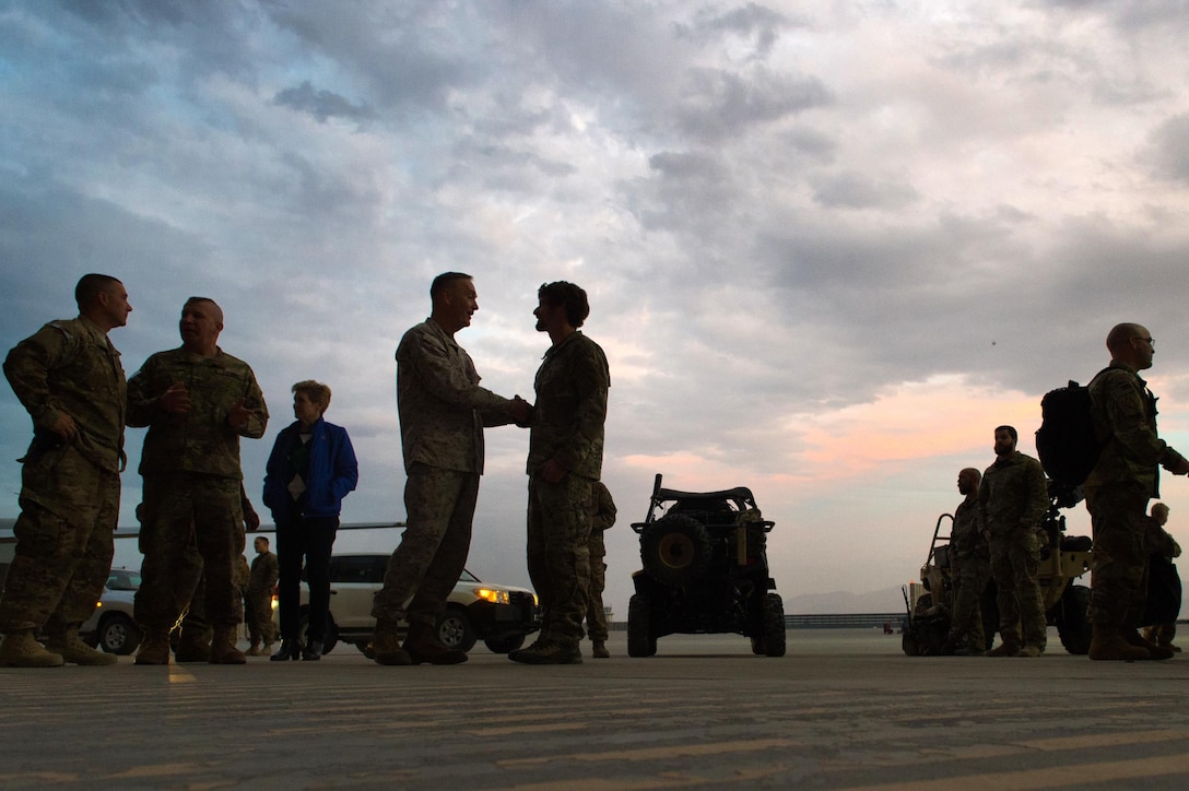 U.S. Marine Corps Gen. Joseph F. Dunford Jr., chairman of the Joint Chiefs of Staff, talks with U.S. service members at Bagram Airfield, Afghanistan, Dec. 8, 2015. DoD photo by D. Myles Cullen