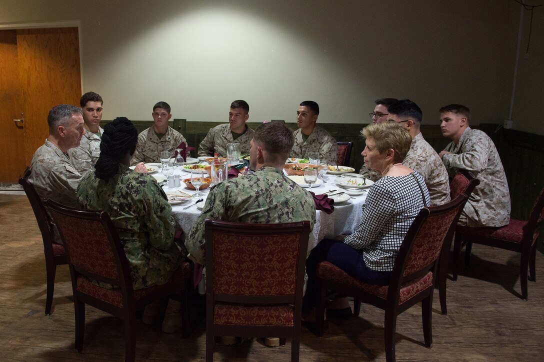 U.S. Marine Corps Gen. Joseph F. Dunford Jr., chairman of the Joint Chiefs of Staff, and his wife, Ellyn Dunford, have dinner with U.S. service members stationed at Naval Support Activity Bahrain, Dec. 7, 2015. The chairman and performers with the 2015 USO Holiday Tour were visiting deployed service members and their families to express the country's gratitude for their service. DoD photo by D. Myles Cullen