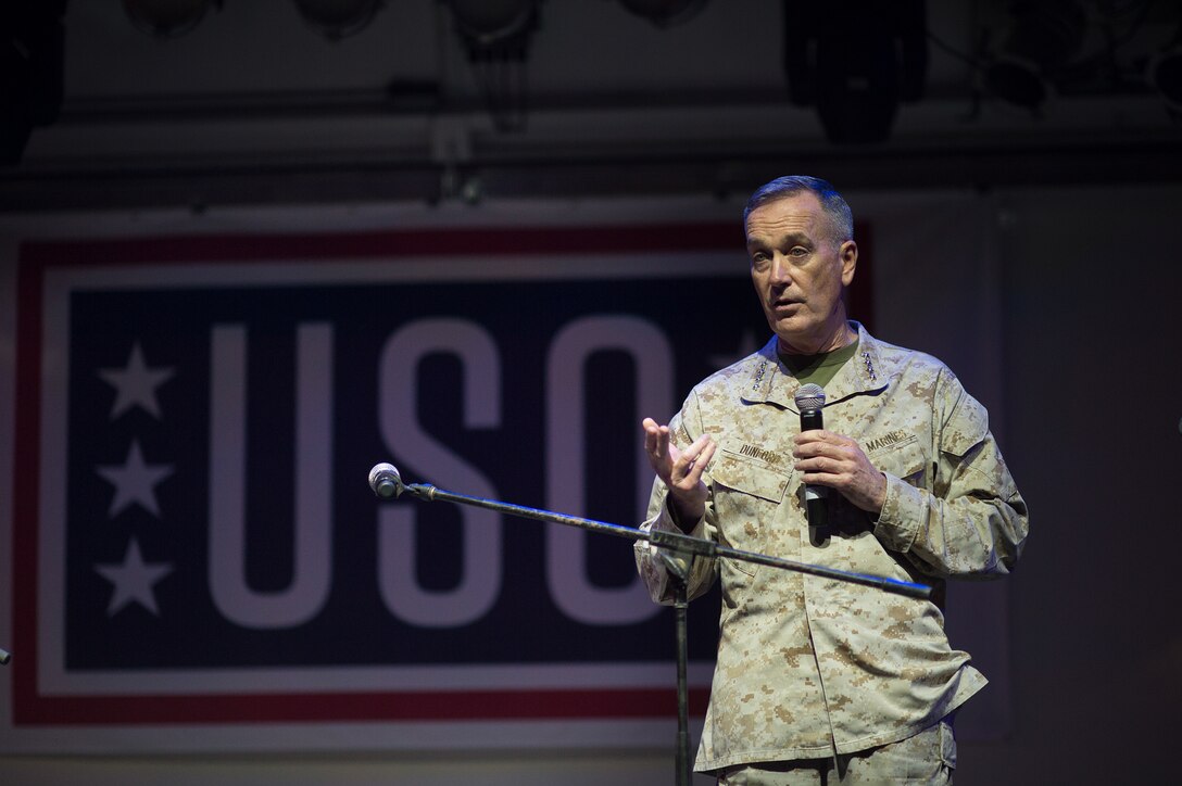 U.S. Marine Corps Gen. Joseph F. Dunford Jr., chairman of the Joint Chiefs of Staff, talks to U.S. service members and their families before a USO show at Naval Support Activity Bahrain, Dec. 7, 2015. DoD photo by D. Myles Cullen