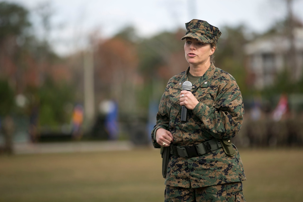 Marine Corps Lt. Col. Lauren Edwards gives a speech after taking command of the 8th Engineer Support Battalion during a change of command ceremony held at Camp Lejeune, N.C., Nov. 30, 2015. “I'm extraordinarily proud to take command of 8th ESB today, and I hope that all Marines and sailors in this battalion recognize that if they work hard and look out for each other they can accomplish whatever they the set their minds to,” Edwards said. U.S. Marine Corps photo by Cpl. Ryan Young