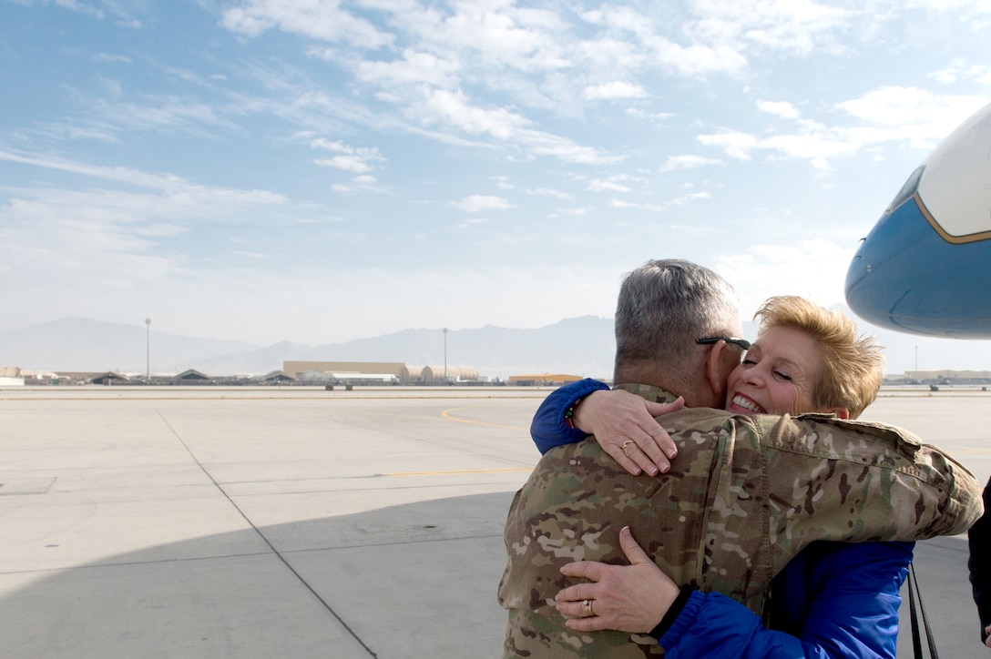 U.S. Army Gen. John F. Campbell, commander of U.S. Forces-Afghanistan and the Resolute Support Mission, greets Ellyn Dunford, wife of Chairman of the Joint Chiefs of Staff Marine Corps Gen. Joseph F. Dunford, at Bagram Airfield, Afghanistan, Dec. 8, 2015. The Dunfords were traveling with members of the 2015 USO Holiday Tour to visit deployed service members. DoD photo by D. Myles Cullen