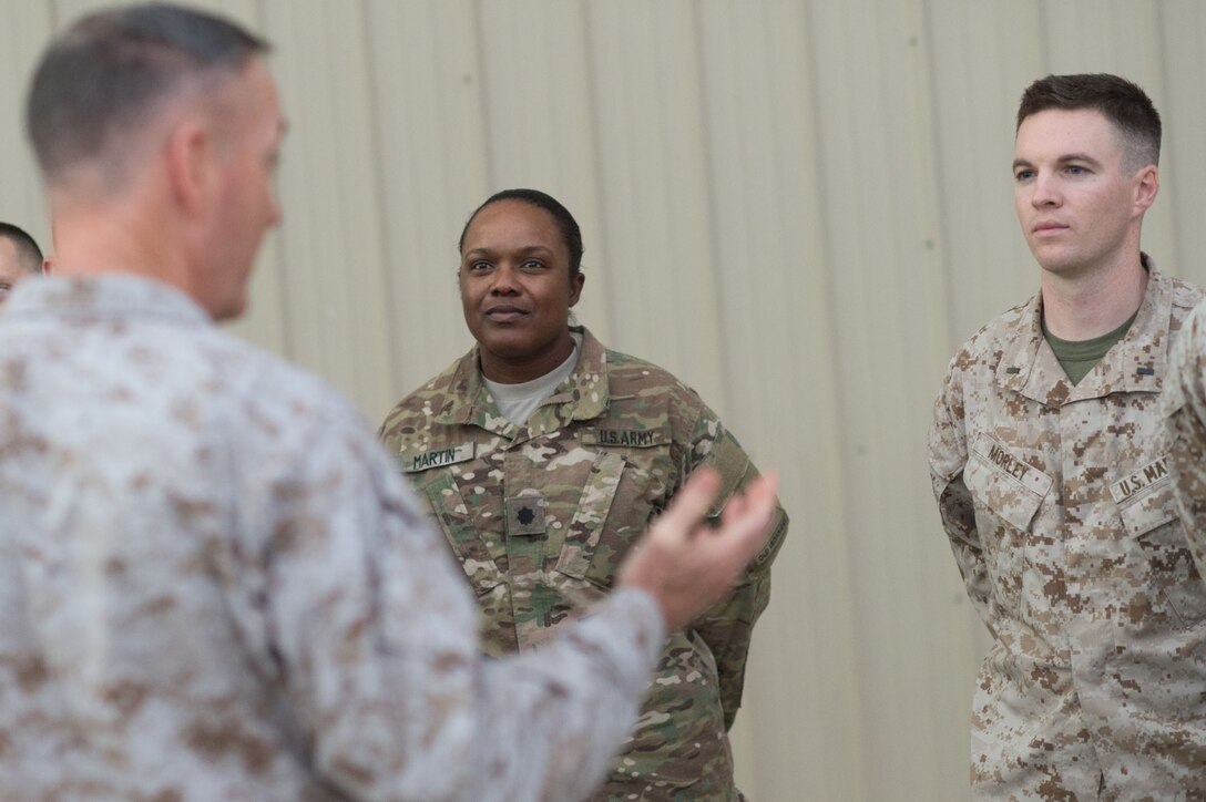 U.S. Marine Corps Gen. Joseph F. Dunford Jr., chairman of the Joint Chiefs of Staff, talks with U.S. service members at Bagram Airfield, Afghanistan, Dec. 8, 2015. Dunford was traveling along with entertainers from the 2015 USO Holiday Tour to visit deployed service members. DoD photo by D. Myles Cullen