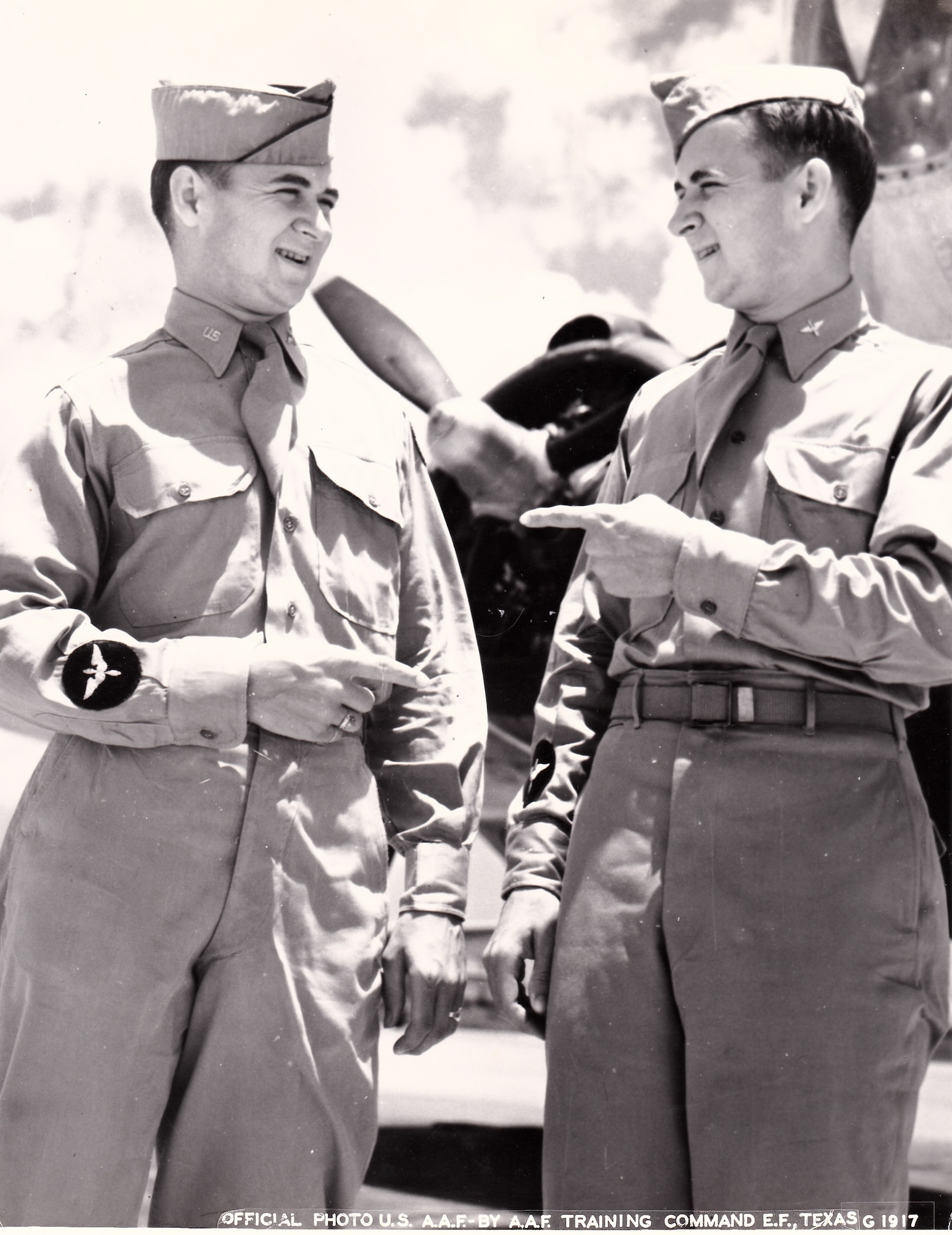 A vintage photo of retired Air Force Reserve Majs. Raymond “Glenn” Clanin and Russell “Lynn” Clanin during training in the Aviation Cadet program, prior to receiving their pilot wings in August 1944 at Ellington Field, Texas. Seventy-one years later, the 92-year-old twin brothers are recipients of the French government's highest distinction for their military service as World War II veterans, the Legion of Honor medal. (Courtesy photo/U.S. Army Air Forces, AAF Training Command)