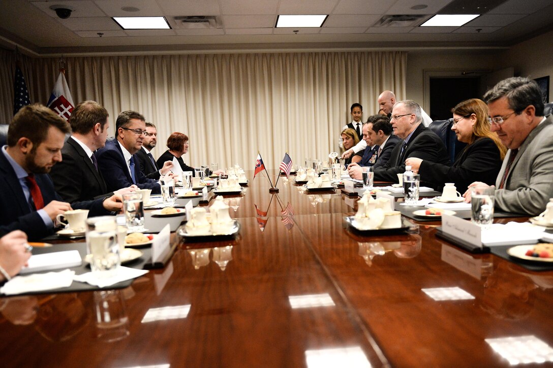 U.S. Deputy Defense Secretary Bob Work, center right, meets with Slovak Defense Minister Martin Glvac at the Pentagon, Dec. 09, 2015. The two leaders met to discuss matters of mutual importance. DoD photo by Army Sgt. First Class Clydell Kinchen
