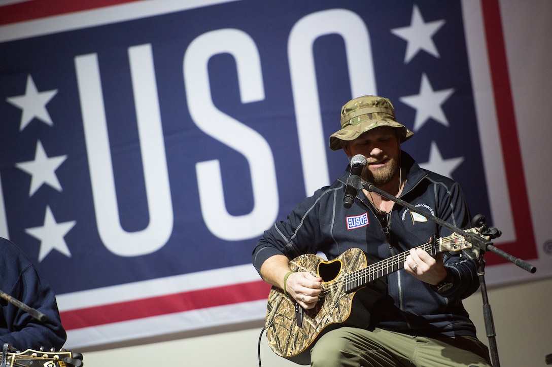 Country musician Kyle Jacobs performs for U.S. service members during a stop by the 2015 USO Holiday Tour at Naval Support Activity Bahrain, Dec. 7, 2015. DoD photo by D. Myles Cullen