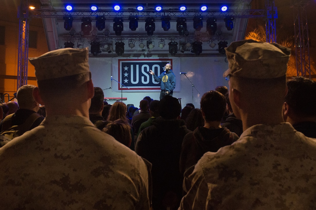 Comedian Sydney Castillo performs for U.S. service members during a stop by the 2015 USO Holiday Tour at Naval Support Activity Bahrain, Dec. 7, 2015. DoD photo by D. Myles Cullen
