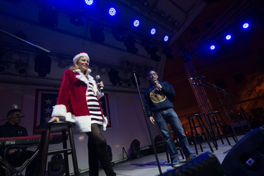 Actress Elizabeth Banks and comedy producer David Wain open a performance by the 2015 USO Holiday Tour at Naval Support Activity Bahrain, Dec. 7, 2015. DoD photo by D. Myles Cullen