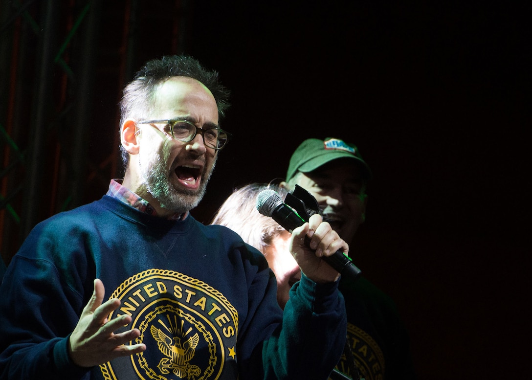 Comedian David Wain sings during a performance by the 2015 USO Holiday Tour at Naval Support Activity Bahrain, Dec. 7, 2015. DoD photo by D. Myles Cullen