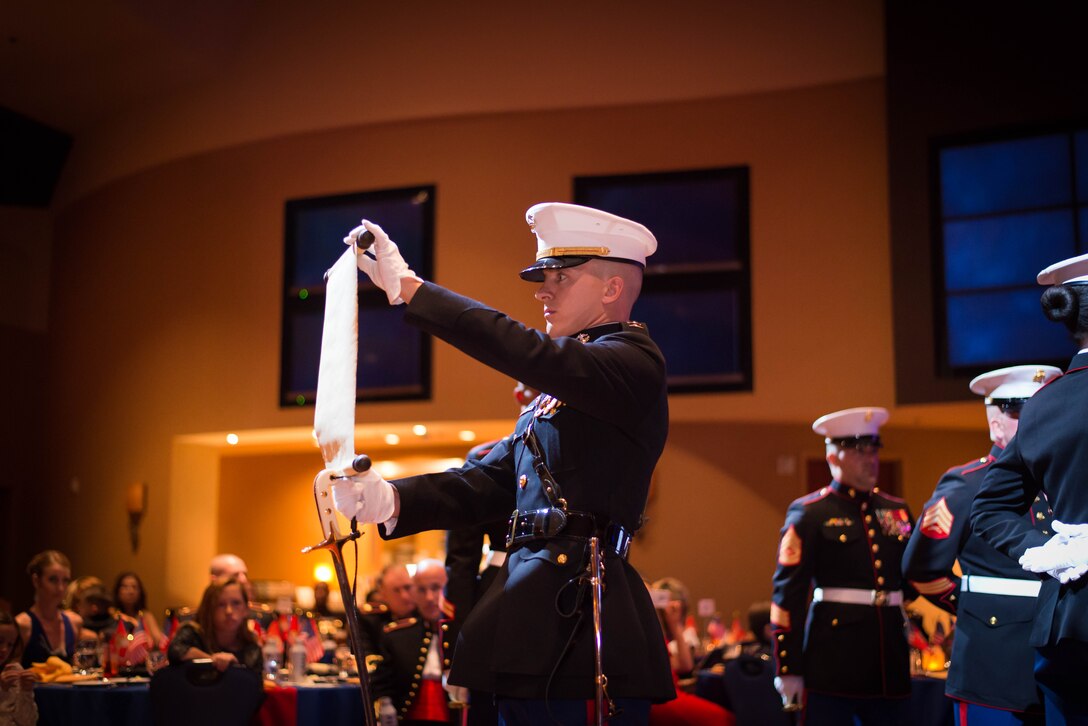 Capt. Terry Herzog, 12th Marine Corps District Adjutant, reads MajGen. John A. Lejuene’s Birthday Message, at the 12th MCD ball ceremony in San Diego, Ca. Nov. 6, 2015. The Birthday Message is read at every Marine Corps Ball and established that a reminder of the honorable service of the Corps be published by every command, to all Marines throughout the globe, on the Birthday of the Corps. (Photo provided by SSgt. Joseph Ford)