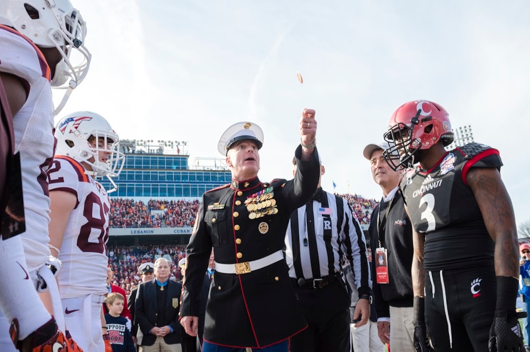 Marine Corps Sgt. Maj. Bryan B. Battaglia, the senior enlisted advisor to the chairman of the Joint Chiefs of Staff, attends the 2014 Military Bowl at Navy-Marine Corps Memorial Stadium in Annapolis, Md., Dec. 27, 2014. Battaglia served as Grand Marshall of the Military Bowl Parade; spoke during a Medal of Honor and USO reception; and conducted the game's coin toss. Virginia Tech defeated Cincinnati 33-17. DoD photo by Army Staff Sgt. Sean K. Harp