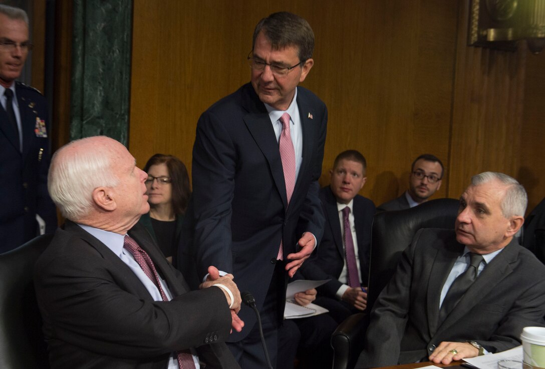 Defense Secretary Ash Carter greets Sen. John McCain before his testifying at a hearing of the U.S. Senate Armed Services Committee on Capitol Hill in Washington, D.C., Dec. 9, 2015. Carter spoke to the committee about the U.S. strategy to counter the Islamic State of Iraq and the Levant. DoD photo by U.S. Navy Petty Officer 1st Class Tim D. Godbee
