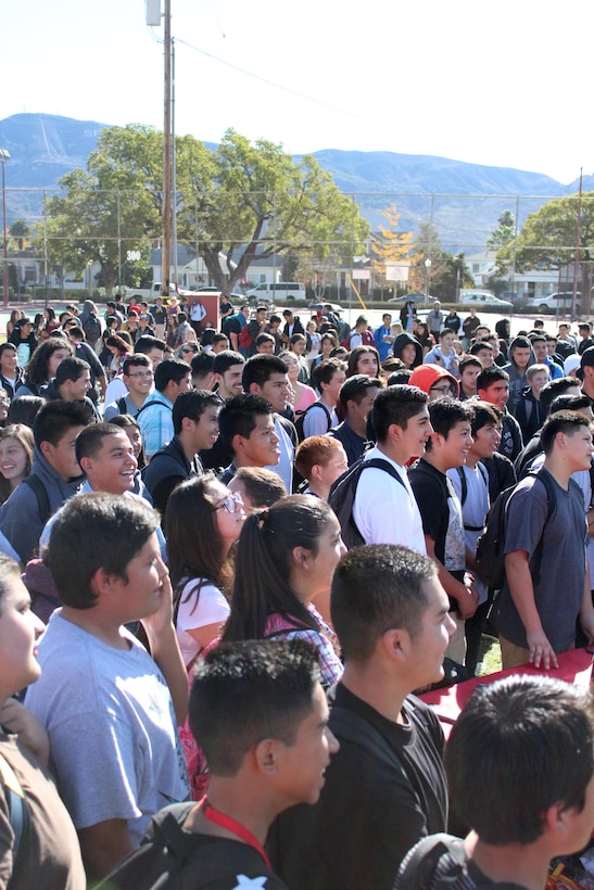 Students of Santa Paula High School watch as Marines from Recruiting Sub Station Ventura conduct the pull-up challenge at the high school, Dec. 8, 2015, in Santa Paula, Calif., as part of an ASA High School Tour event. ASA brings in five of the world's top professional skateboarders, inline skaters and BMX riders from the X Games to perform on a state-of-the art half-pipe. Marines from RSS Ventura supported the event to inform students about the Marine Corps. (U.S. Marine Corps photo by Staff Sgt. Alicia R. Leaders/Released)