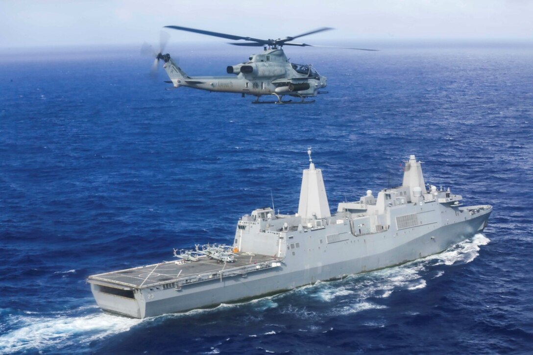 PACIFIC OCEAN (Nov. 30, 2015) An AH-1Z Viper with Marine Medium Tiltrotor Squadron 161, 15th Marine Expeditionary Unit, flies above the USS Anchorage (LPD 23). The 15th MEU is currently deployed in the Indo-Asia-Pacific region to promote regional stability and security in the U.S. 7th Fleet area of operations. (U.S. Marine Corps photo by Sgt. Jamean Berry/Released)