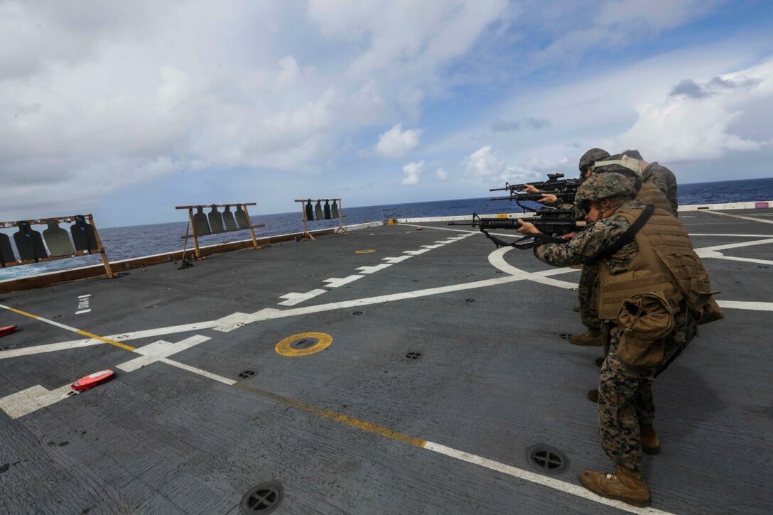 PACIFIC OCEAN (Dec. 2, 2015) U.S. Marines with Marine Medium Tiltrotor Squadron 161 (Reinforced), 15th Marine Expeditionary Unit, fire M16 carbine rifles during a deck shoot  aboard the USS Anchorage (LPD 23).    The 15th MEU is currently returning from a routine seven-month deployment to the US Pacific and Central Command areas of responsibility. (U.S. Marine Corps photo by Sgt. Jamean Berry/Released)