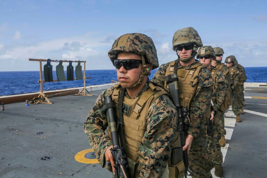 PACIFIC OCEAN (Dec. 2, 2015) U.S. Marine Cpl. Alejandro Guerra practices pivot drills during a deck shoot aboard the USS Anchorage (LPD 23).  Guerra is an airframes mechanic with Marine Medium Tiltrotor Squadron 161 (Reinforced), 15th Marine Expeditionary Unit.  The 15th MEU is currently returning from a routine seven-month deployment to the US Pacific and Central Command areas of responsibility. (U.S. Marine Corps photo by Sgt. Jamean Berry/Released)
