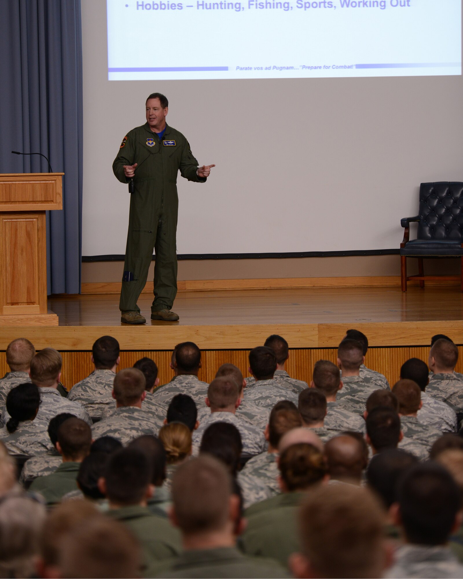 Maj. Gen. James Hecker, 19th Air Force commander, speaks at an all-call at Laughlin Air Force Base, Texas, Dec. 4, 2015. During the all-call, Hecker spoke to Laughlin Airmen about the importance of family, professionalism, and Comprehensive Airmen Fitness. (U.S. Air Force photo by Senior Airman Jimmie D. Pike)