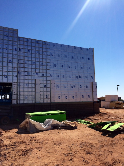 CANNON AIR FORCE BASE, N.M. – The installation of polyisocyanurate insulation on a building on base, Sept. 28, 2015. Photo by James Vigil. 