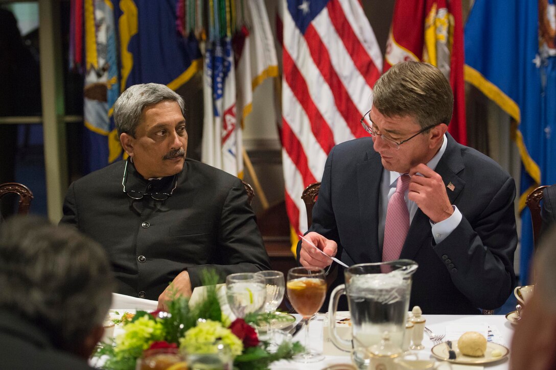 U.S. Defense Secretary Ash Carter, right, speaks with Indian Defense Minister Manohar Parrikar during a dinner at the Pentagon, Dec. 9, 2015. DoD photo by Air Force Senior Master Sgt. Adrian Cadiz