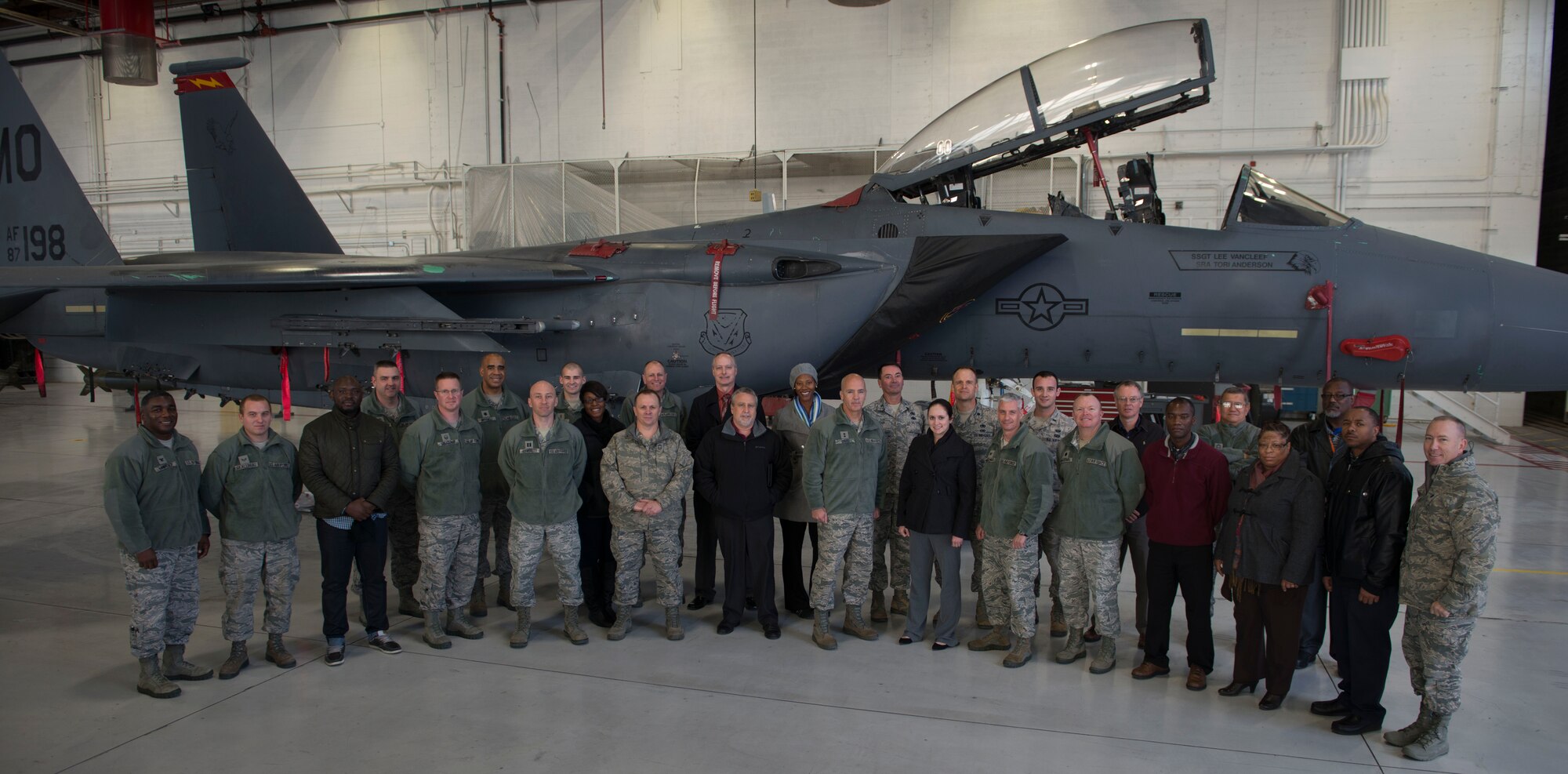 Maj. Gen. Glenn Davis, Air Force Life Cycle Management Center mobilization assistant to the commander, and members of the 366th Maintenance Group pose for a group photo at Mountain Home Air Force Base, Idaho, Dec. 3, 2015. During his time on the base, Davis received an operations brief, toured the Aircraft Maintenance Squadron and visited airmen in their workcenters. (U.S. Air Force photo by Senior Airman Malissa Lott/RELEASED)