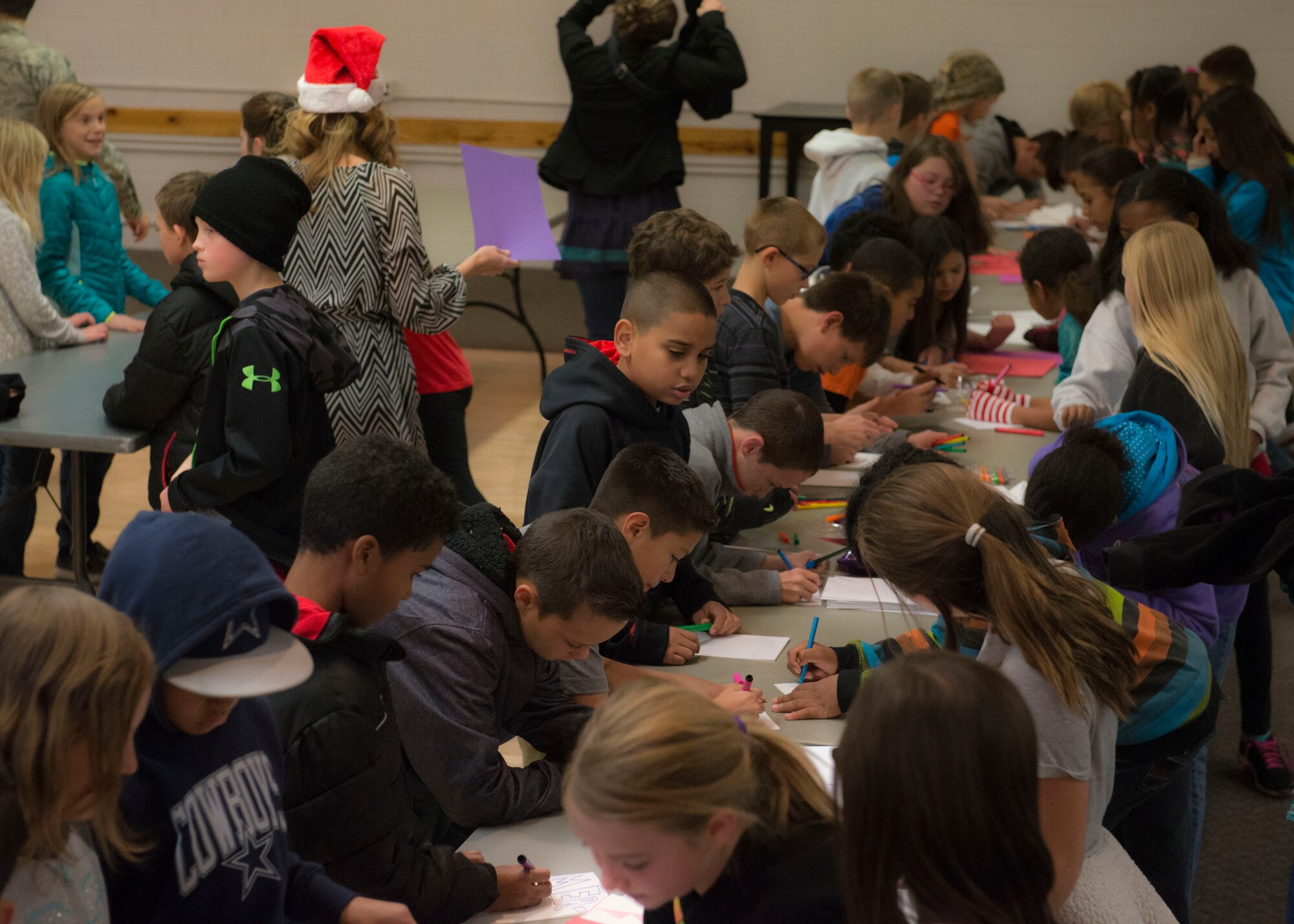 Thousands of cookies were donated during the 2015 Holloman cookie drive at Holloman Air Force Base N.M., Dec. 7. One donation from a 93-year-old World War II veteran was read to the volunteers. The Holloman Cookie Drive serves to provide Airmen who may not be able to go home for the holidays a little bit of cheer. (U.S. Air Force photo by Senior Airman Chase Cannon)
