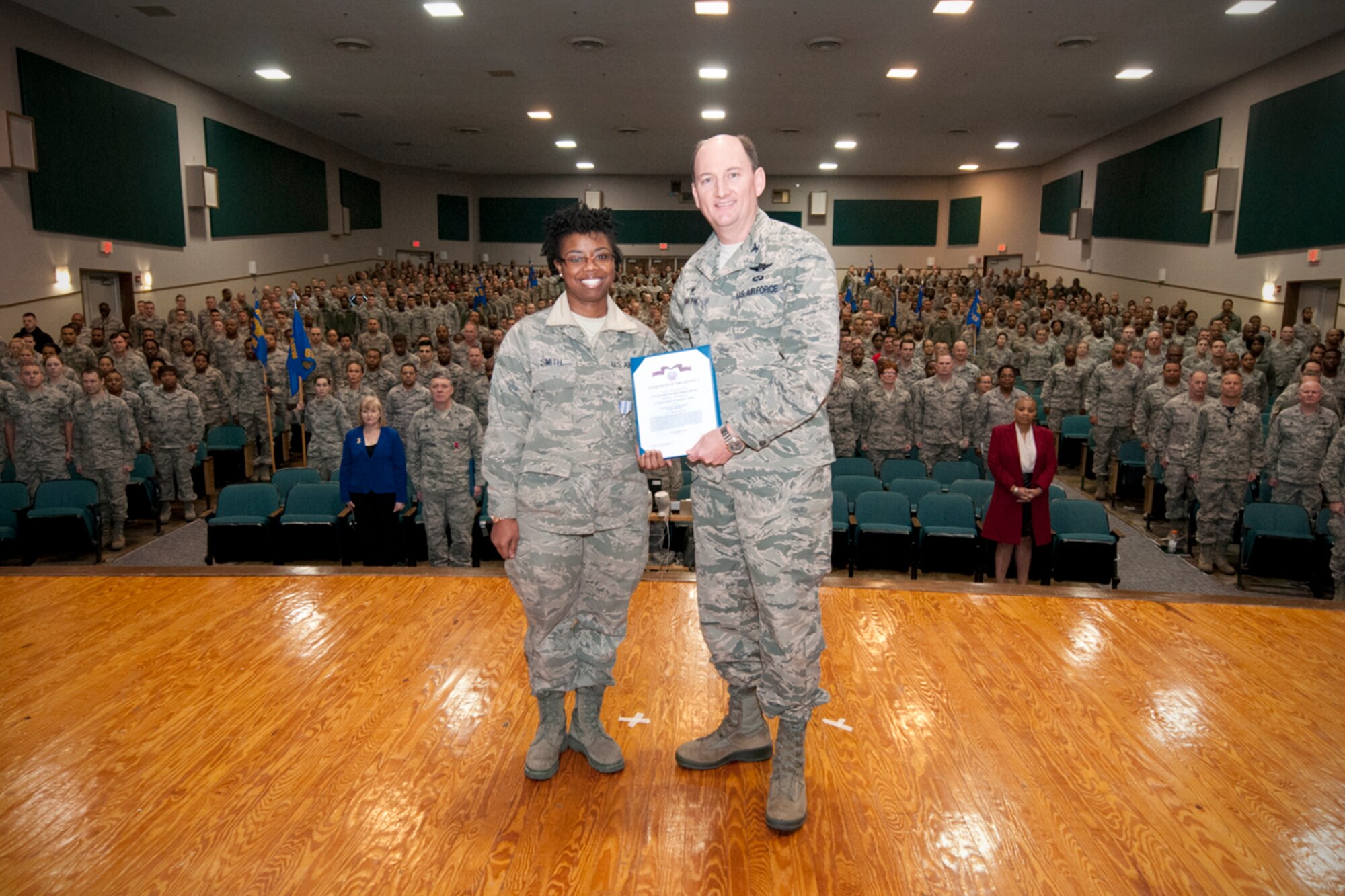 Technical Sgt. Ronesia L. Smith, 459th Air Refueling Wing knowledge operations manager, received the The Air Force Achievement Medal during the 459 ARW Commander’s Call at the Base Theater, Joint Base Andrews, Md., Dec. 6, 2015, for her actions in saving the life of a child earlier in the year. (U.S. Air Force photo by Staff Sgt. Kat Justen)