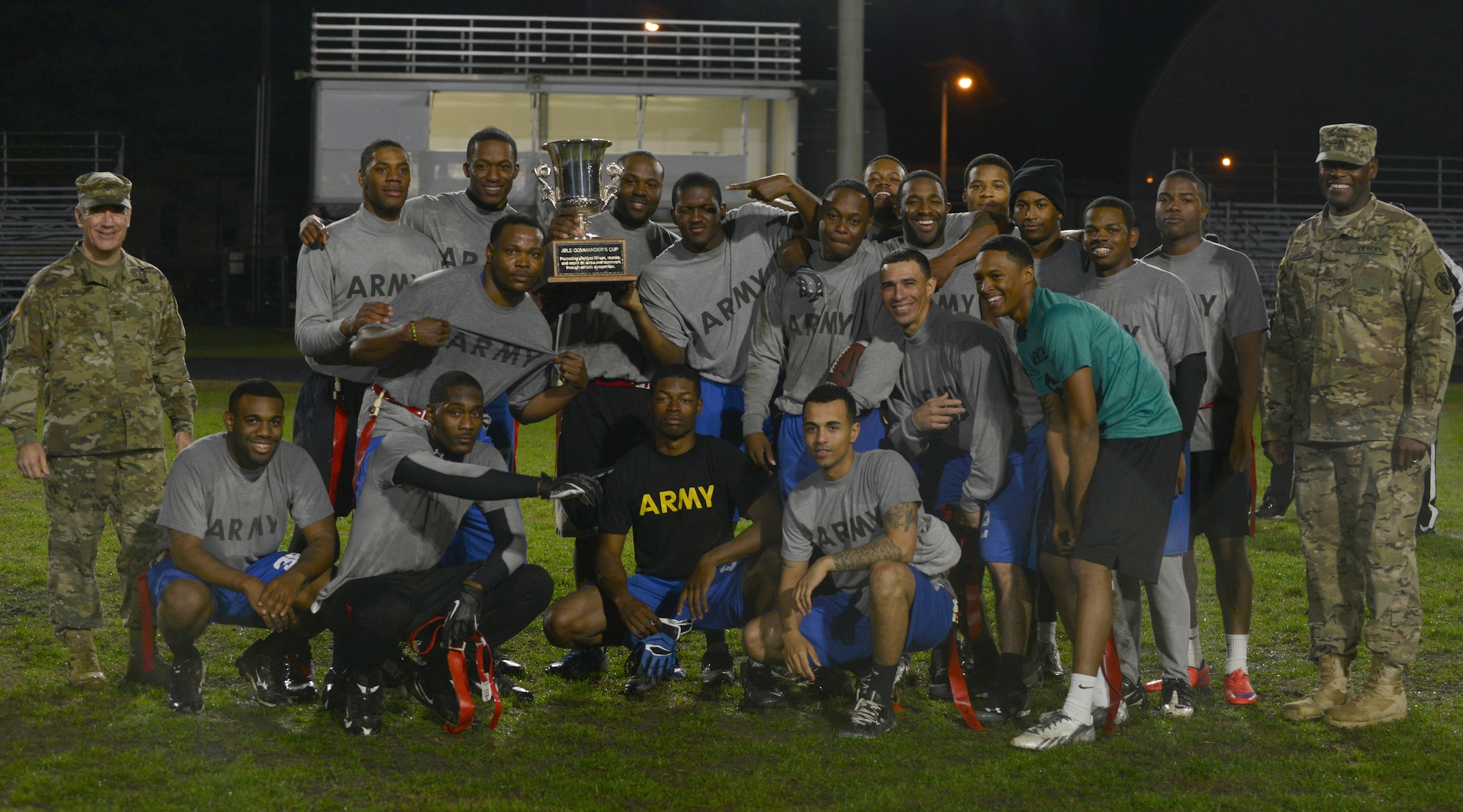 The Fort Eustis All-Stars celebrate winning the Joint Base Langley-Eustis flag football championship at Fort Eustis, Va., Dec. 2, 2015.  The location of the different championship games alter between the installations to ease fans’ ability to attend. ( U.S. Air Force photo by Staff Sgt. Natasha Stannard)