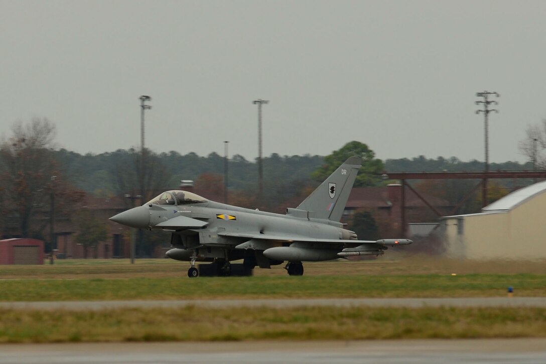 A British Royal Air Force (RAF) Typhoon lands at Langley Air Force Base, Va., Dec. 3, 2015. The inaugural Trilateral Exercise will display the capabilities of the F-22 Raptor, RAF Typhoon and the French air force Rafale. (U.S. Air Force photo by Airman 1st Class Derek Seifert)