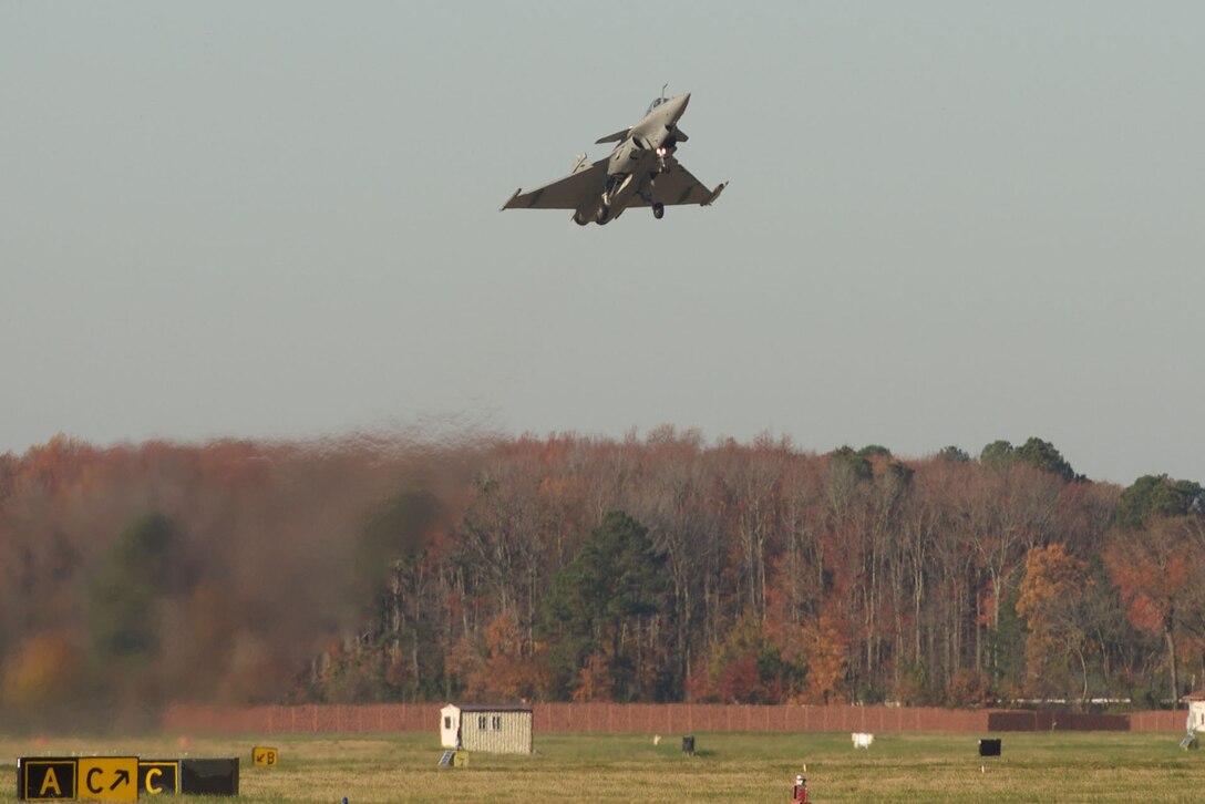A French air force (FrAF) Rafale takes off as part of the inaugural Trilateral Exercise at Langley Air Force Base, Va., Dec. 4, 2015. The exercise gave the U.S. Air Force, British Royal Air Force and FrAF personnel the opportunity to share and develop techniques, tactics and procedures to utilize in a joint theater of operations. (U.S. Air Force photo by Airman 1st Class Derek Seifert)