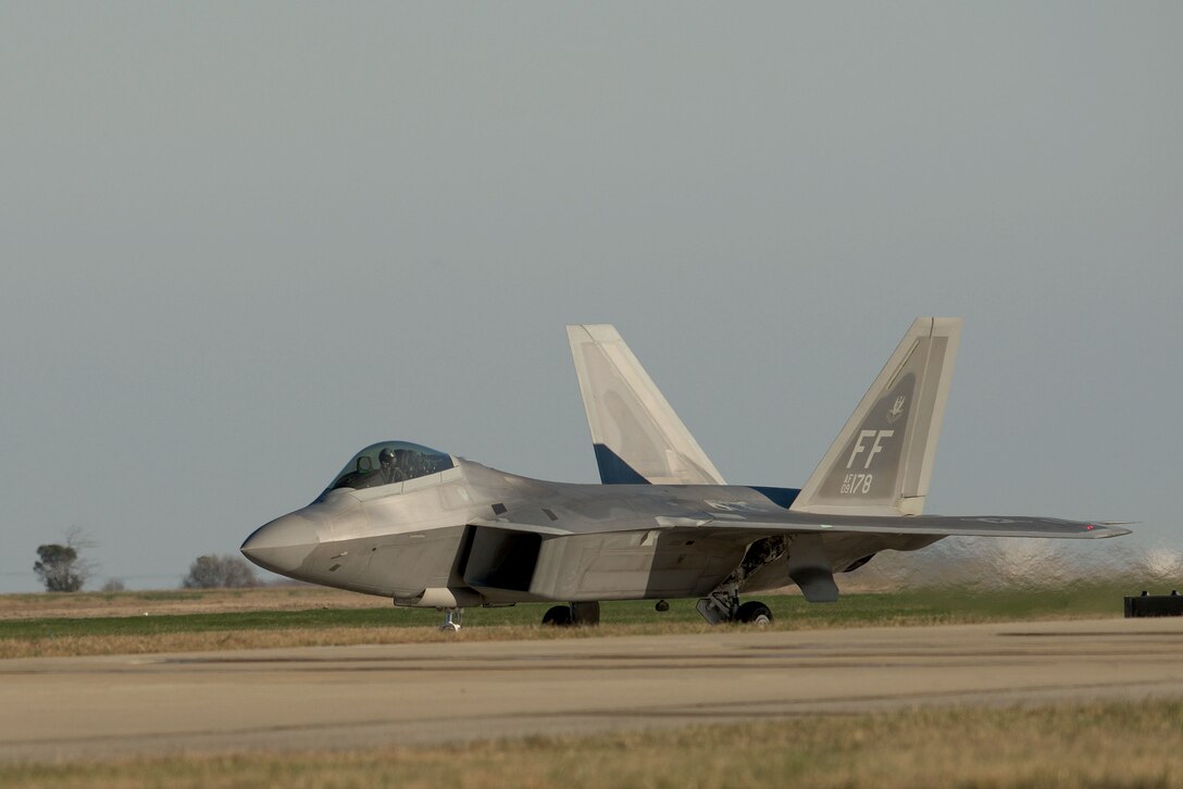 A U.S. Air Force F-22 Raptor prepares for takeoff at Langley Air Force Base, Va., Dec. 4, 2015. Airmen partnered with British Royal Air Force and French air force personnel during the inaugural Trilateral Exercise hosted by the 1st Fighter Wing. (U.S. Air Force photo by Airman 1st Class Derek Seifert)