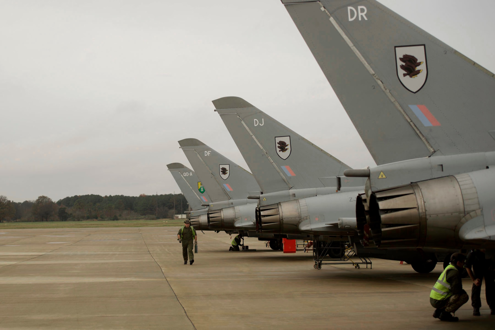British Royal Air Force (RAF) maintainers perform post flight checks at Langley Air Force Base, Va., Dec. 3, 2015. Approximately 175 RAF personnel will participate in the inaugural Trilateral Exercise. (U.S. Air Force photo by Airman 1st Class Derek Seifert)