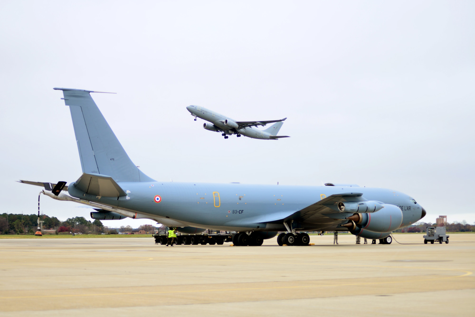 A British Royal Air Force Voyager flies over a French air force C-135FR prior to the inaugural Trilateral Exercise, at Langley Air Force Base, Va., Dec. 1, 2015. While the U.S. Air Force holds various exercises with allied and partner nations throughout the world, this particular exercise is one of the first to focus on greater integration of 5th generation aircraft capabilities. (U.S. Air Force photo by Senior Airman Aubrey White)
