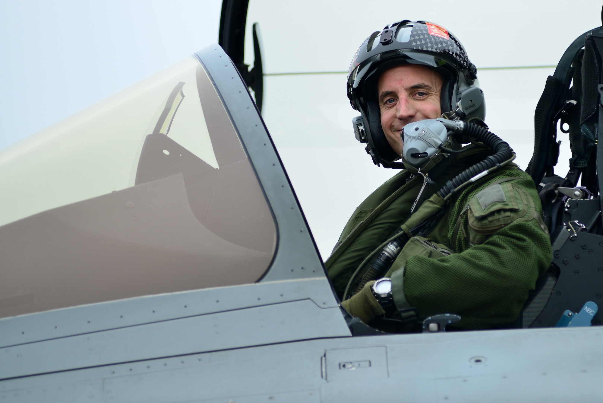 A French air force pilot arrives for the inaugural Trilateral Exercise, at Langley Air Force Base, Va., Dec. 1, 2015. The exercise was designed to encourage sharing and development of air combat tactics, techniques and procedures with French and UK partners against a range of potential threats. (U.S. Air Force photo by Senior Airman Aubrey White)