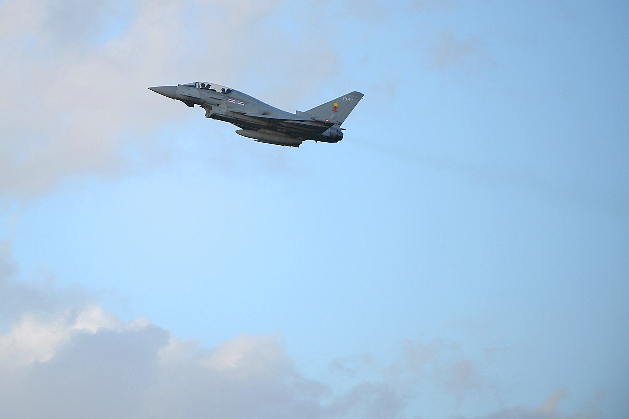 A Eurofighter Typhoon assigned to Royal Air Force Coningsby soars over Royal Air Force Lakenheath, England, Dec. 8, 2015. Members of the 494th FS worked with the RAF pilots to strengthen U.S. Air Force interoperability with the U.K. counterparts through combat training. (U.S. Air Force photo by Staff Sgt. Emerson Nuñez/Released) 