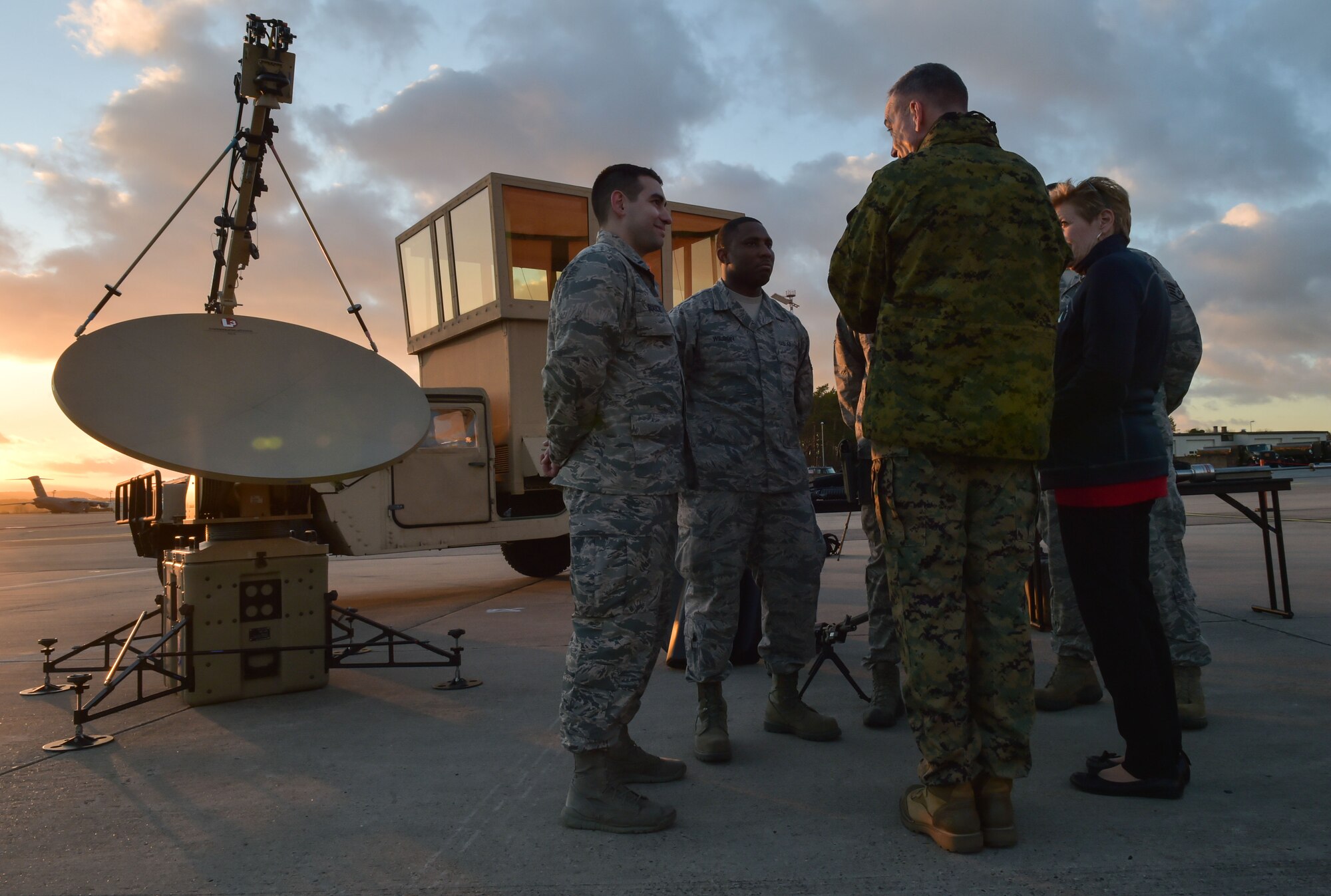 U.S. Marine Corps Gen. Joseph F. Dunford Jr., chairman of the Joint Chiefs of Staff, speaks to personnel from the 435th Air Ground Operations Wing about their time in Germany during the 2015 USO  Holiday Troop Tour, Dec. 9, 2015 at Ramstein Air Base, Germany. This is the 15th year of the USO Troop Tour. (U.S. Air Force photo/Staff Sgt. Leslie Keopka)